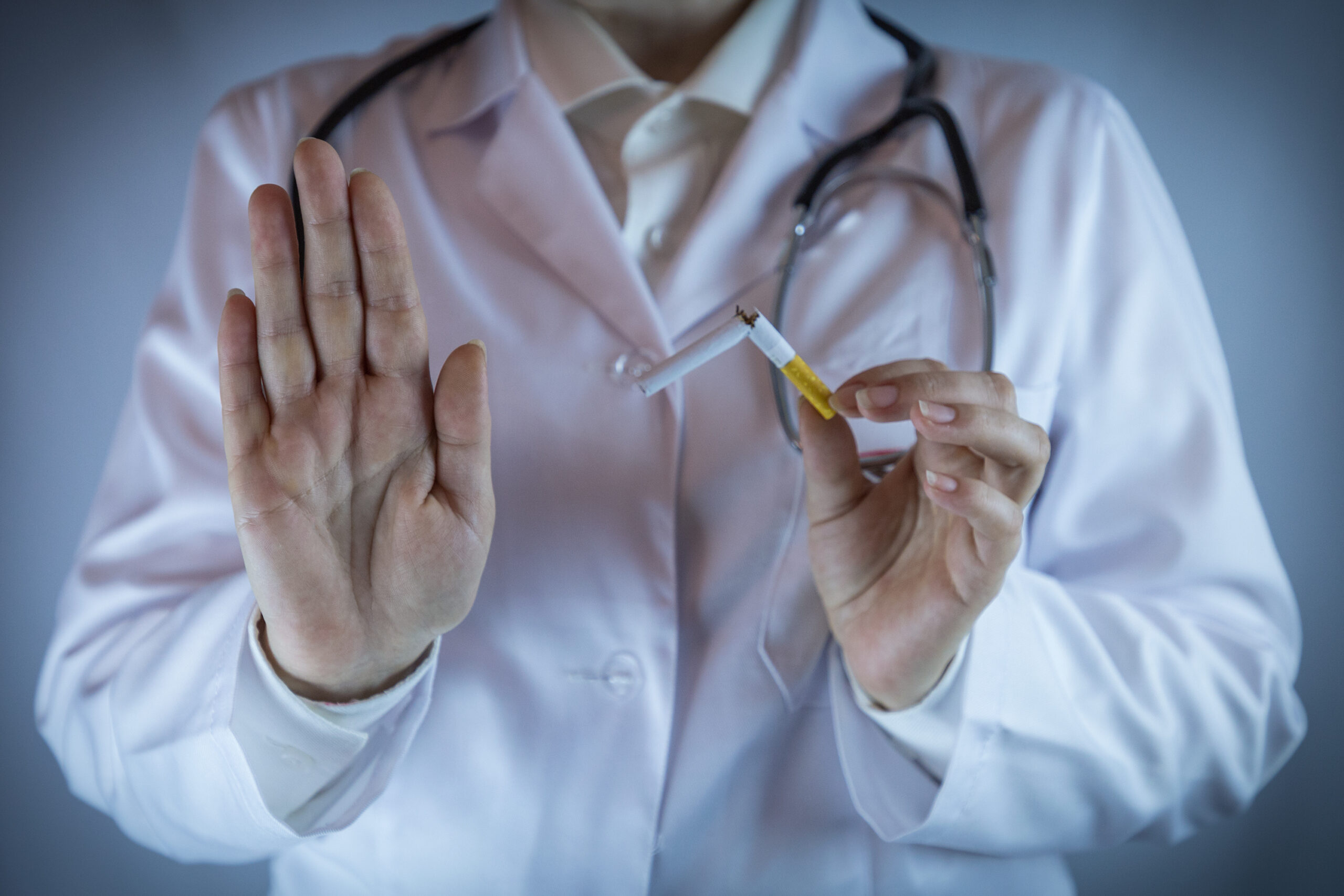 The,Doctor,Shows,A,Stop,Gesture,,The,Other,Hand,Holds